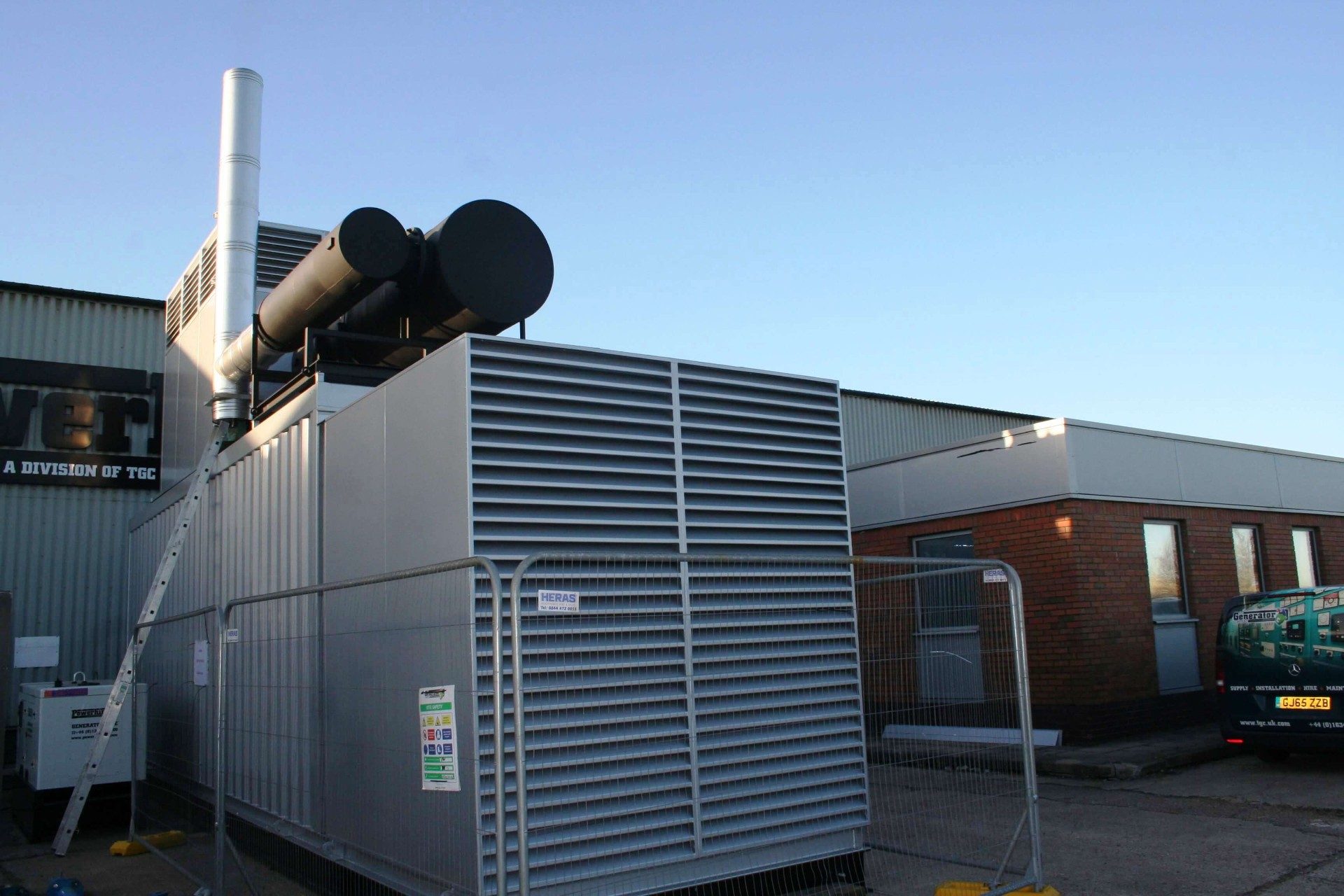 Standby generator set in an enclosure